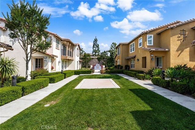 8090 Cornwall Ct Unit 33, Rancho Cucamonga, CA 91739 - surrounding community featuring a residential view and a yard