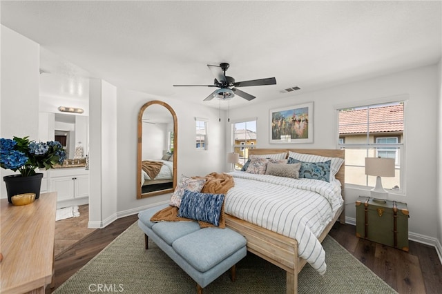 8090 Cornwall Ct Unit 33, Rancho Cucamonga, CA 91739 - bedroom with multiple windows, dark wood-type flooring, and baseboards