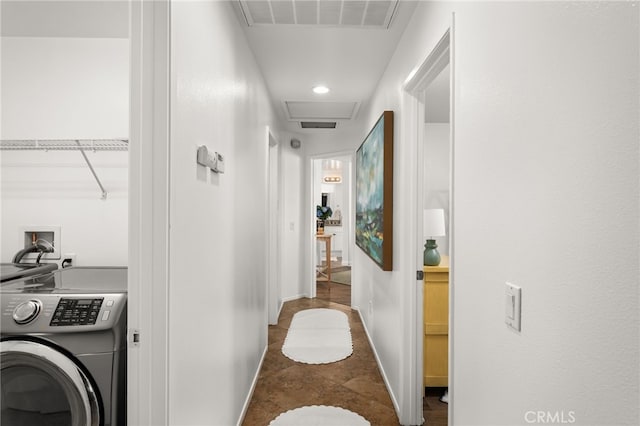 8090 Cornwall Ct Unit 33, Rancho Cucamonga, CA 91739 - hallway with washer / dryer, attic access, and baseboards