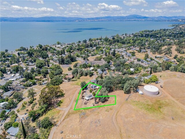 3788 Lakeview Ter, Lucerne, CA 95458 - aerial view of property and surrounding area with property boundaries highlighted and a water and mountain view