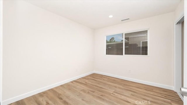 19029 Pires Ave, Cerritos, CA 90703 - spare room with baseboards, light wood finished floors, and recessed lighting