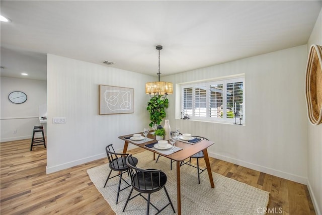1456 Fernwood Dr, Redlands, CA 92374 - dining room featuring light wood-style flooring, baseboards, recessed lighting, and a chandelier
