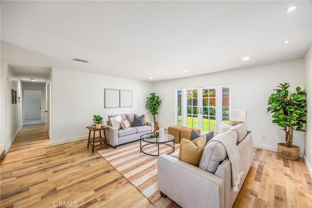 1456 Fernwood Dr, Redlands, CA 92374 - living room featuring light wood-type flooring, french doors, recessed lighting, and baseboards