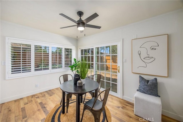 1456 Fernwood Dr, Redlands, CA 92374 - dining space with baseboards, ceiling fan, crown molding, and wood finished floors