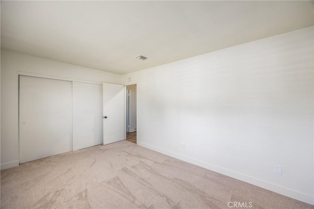 1456 Fernwood Dr, Redlands, CA 92374 - unfurnished bedroom featuring carpet flooring and a closet