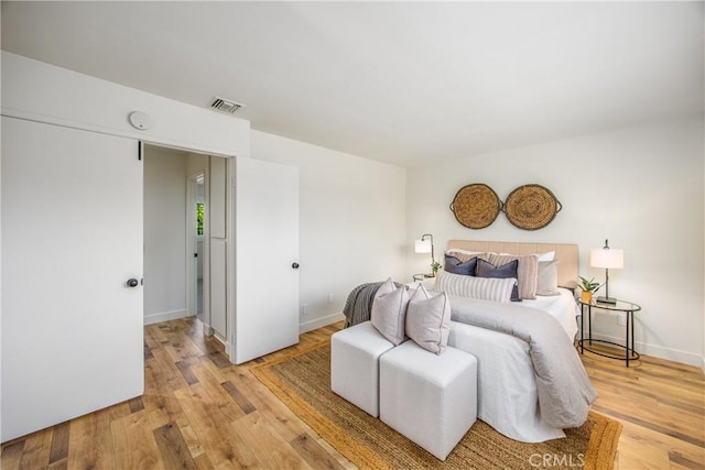 1456 Fernwood Dr, Redlands, CA 92374 - bedroom featuring light wood-style flooring and baseboards