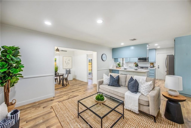 1456 Fernwood Dr, Redlands, CA 92374 - living room featuring light wood finished floors, recessed lighting, baseboards, and a ceiling fan