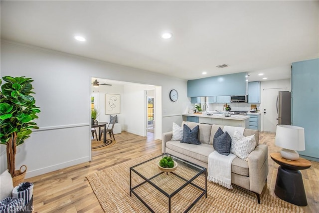 1456 Fernwood Dr, Redlands, CA 92374 - living room featuring light wood-type flooring, recessed lighting, and a ceiling fan