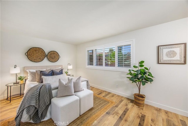1456 Fernwood Dr, Redlands, CA 92374 - bedroom featuring baseboards and wood finished floors