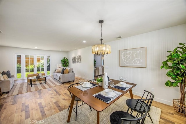 1456 Fernwood Dr, Redlands, CA 92374 - dining space with light wood-style floors, a chandelier, and recessed lighting