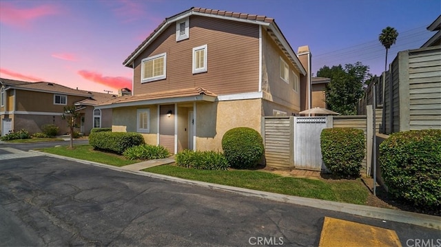 9900 Tagus St Unit 30, Pico Rivera, CA 90660 - traditional-style house with stucco siding and a tiled roof
