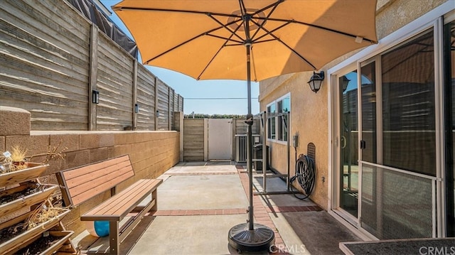 9900 Tagus St Unit 30, Pico Rivera, CA 90660 - fenced backyard featuring a patio