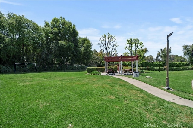 9900 Tagus St Unit 30, Pico Rivera, CA 90660 - view of community featuring a pergola and a lawn