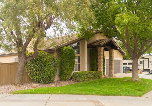 980 Creston Way, Beaumont, CA 92223 - view of front of house with stucco siding, a garage, concrete driveway, and a tiled roof