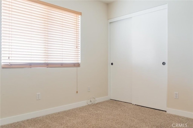 980 Creston Way, Beaumont, CA 92223 - unfurnished bedroom with carpet, a closet, and baseboards