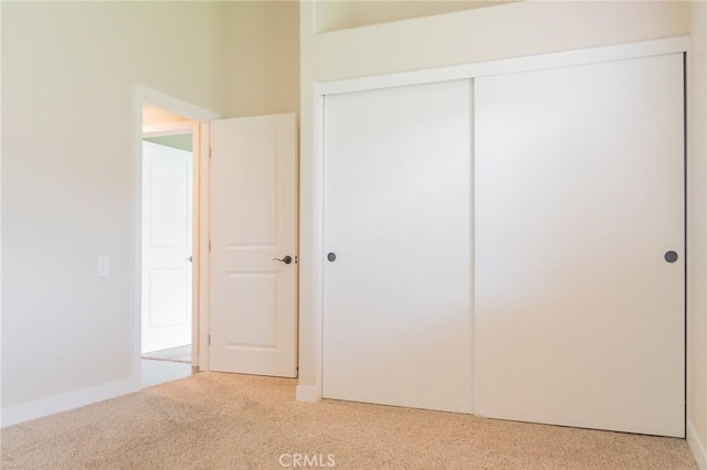 980 Creston Way, Beaumont, CA 92223 - unfurnished bedroom with light colored carpet and a closet