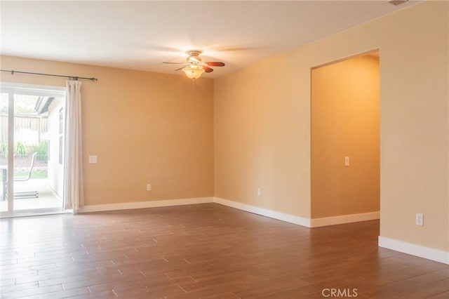 980 Creston Way, Beaumont, CA 92223 - empty room with a ceiling fan, dark wood-style flooring, and baseboards
