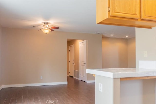 980 Creston Way, Beaumont, CA 92223 - kitchen with ceiling fan, dark wood-type flooring, tile countertops, baseboards, and recessed lighting
