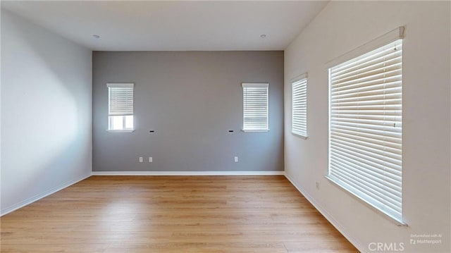 4322 Waterside Ln, Oxnard, CA 93035 - empty room with light wood finished floors and baseboards