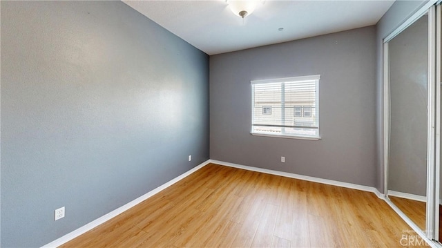 4322 Waterside Ln, Oxnard, CA 93035 - empty room featuring wood finished floors and baseboards