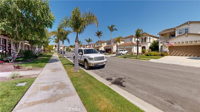 4322 Waterside Ln, Oxnard, CA 93035 - view of asphalt street featuring sidewalks, a residential view, and curbs