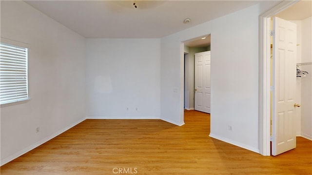 4322 Waterside Ln, Oxnard, CA 93035 - spare room with light wood-style flooring, baseboards, and a smoke detector