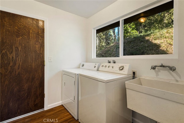 64 Rebie Way, Oroville, CA 95966 - laundry area featuring washing machine and dryer, dark wood-type flooring, and baseboards