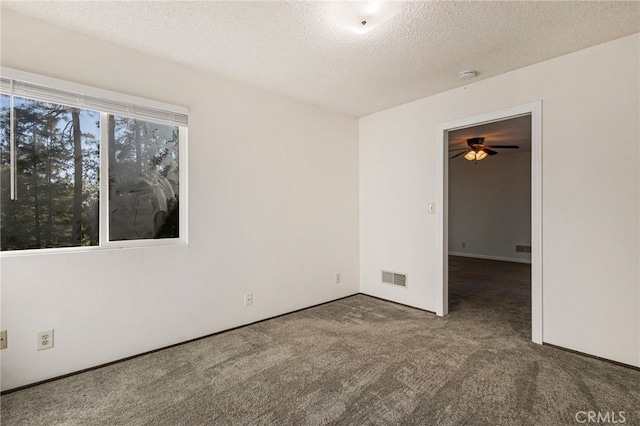 64 Rebie Way, Oroville, CA 95966 - empty room featuring carpet floors, a textured ceiling, a ceiling fan, and a smoke detector