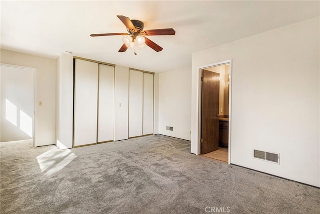 64 Rebie Way, Oroville, CA 95966 - unfurnished bedroom with multiple closets, carpet flooring, ensuite bath, and ceiling fan