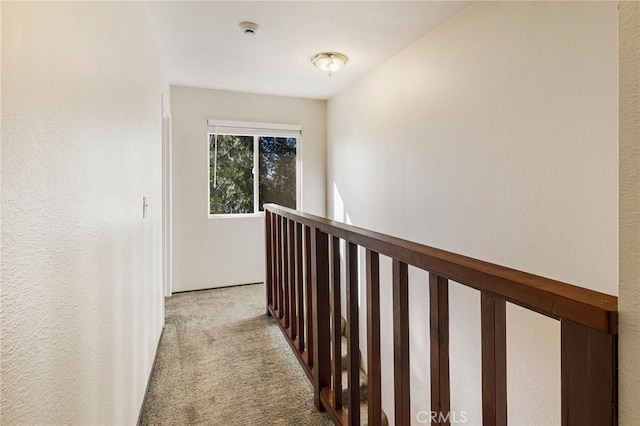 64 Rebie Way, Oroville, CA 95966 - corridor with light colored carpet and an upstairs landing