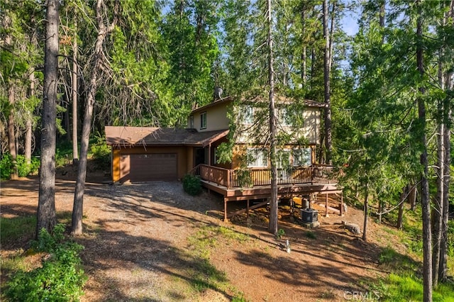 64 Rebie Way, Oroville, CA 95966 - view of front of property featuring a garage, a wooden deck, and dirt driveway