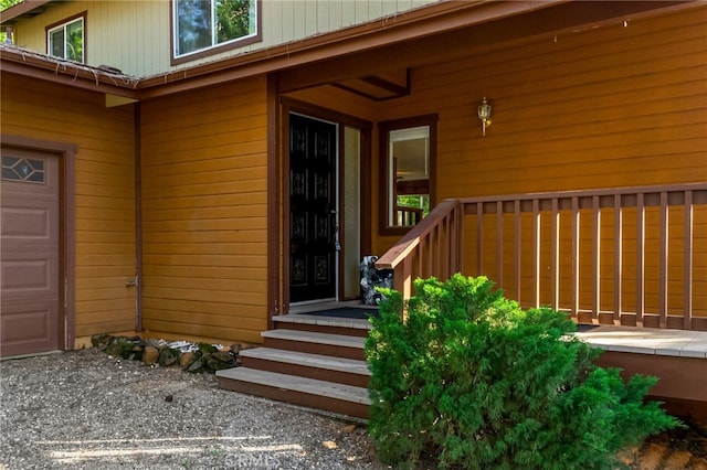 64 Rebie Way, Oroville, CA 95966 - doorway to property featuring a garage