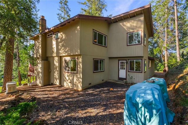 64 Rebie Way, Oroville, CA 95966 - rear view of property with a chimney and crawl space