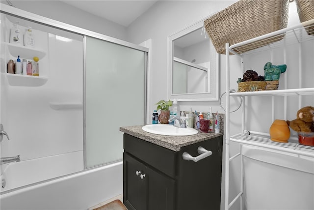1665 E 84th St, Los Angeles, CA 90001 - bathroom featuring shower / bath combination with glass door and vanity