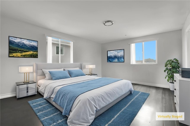 1665 E 84th St, Los Angeles, CA 90001 - bedroom with baseboards and wood finished floors