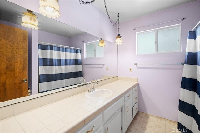 8950 Pueblo Ave, Atascadero, CA 93422 - full bath with vanity, tile patterned floors, and a shower with shower curtain