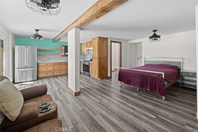 8950 Pueblo Ave, Atascadero, CA 93422 - bedroom featuring freestanding refrigerator and wood finished floors