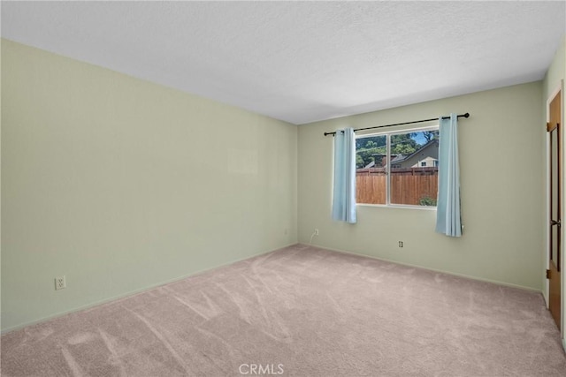 8950 Pueblo Ave, Atascadero, CA 93422 - empty room with carpet and a textured ceiling