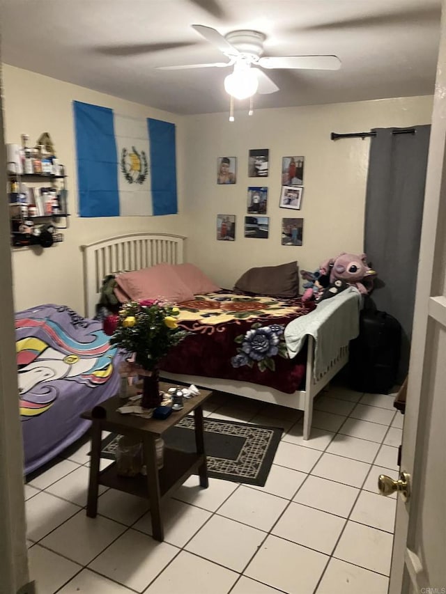 386771 Menlo Ave, San Diego, CA 92105 - bedroom featuring light tile patterned floors and ceiling fan