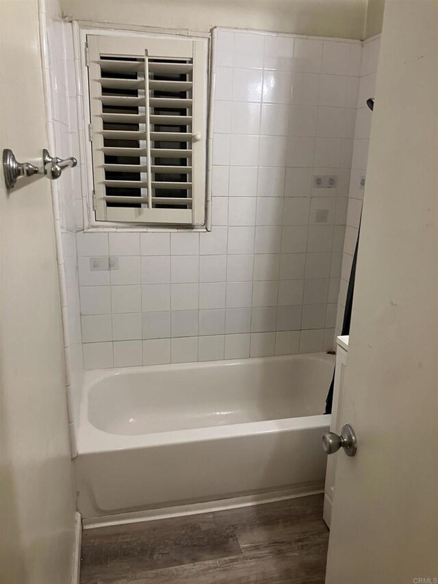 386771 Menlo Ave, San Diego, CA 92105 - full bathroom with wood finished floors and  shower combination