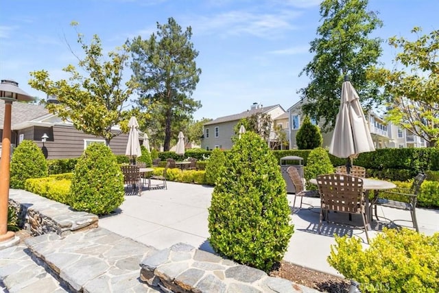 23402 Brookdale Ln Unit 56, Valencia, CA 91355 - view of patio with outdoor dining area