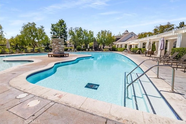 23402 Brookdale Ln Unit 56, Valencia, CA 91355 - community pool featuring a patio area and a pergola