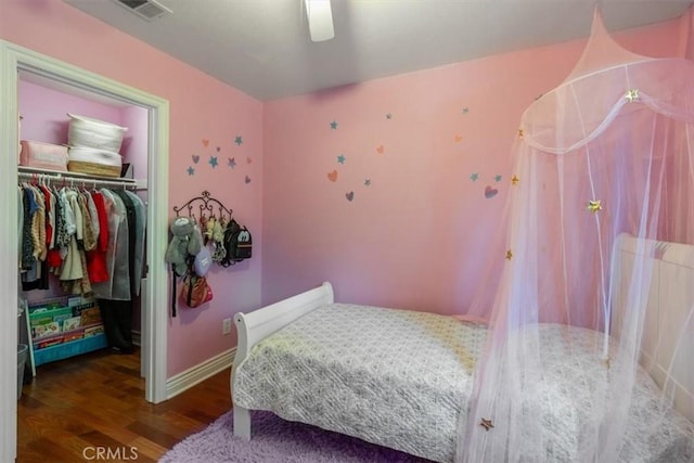 23402 Brookdale Ln Unit 56, Valencia, CA 91355 - bedroom featuring a closet, a spacious closet, wood finished floors, and a ceiling fan