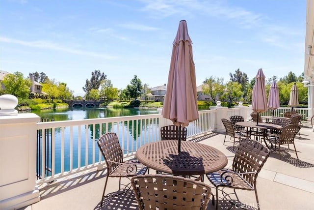 23402 Brookdale Ln Unit 56, Valencia, CA 91355 - view of patio featuring outdoor dining area and a water view