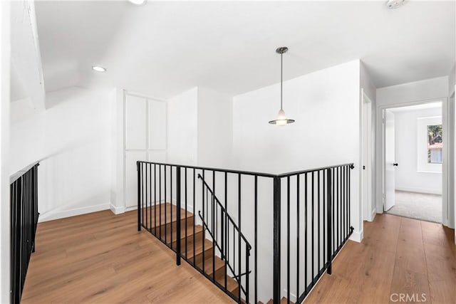 659 Valley Oak Ln, Newbury Park, CA 91320 - corridor with an upstairs landing, wood finished floors, recessed lighting, and baseboards