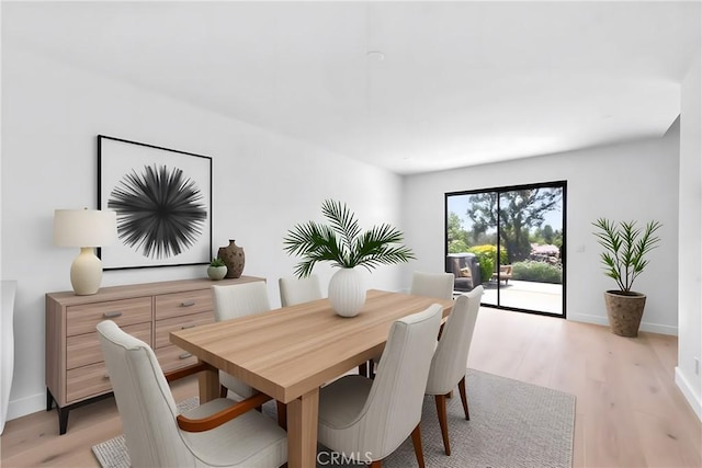 659 Valley Oak Ln, Newbury Park, CA 91320 - dining room with light wood-type flooring and baseboards
