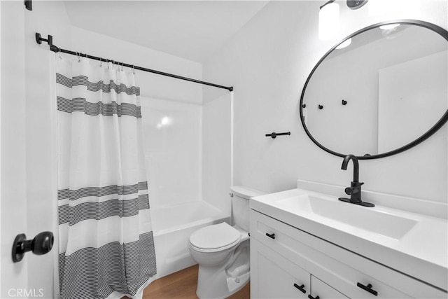 659 Valley Oak Ln, Newbury Park, CA 91320 - bathroom featuring vanity, toilet, shower / bath combo with shower curtain, and wood finished floors