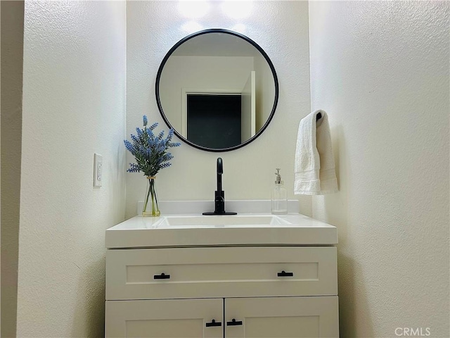 659 Valley Oak Ln, Newbury Park, CA 91320 - bathroom featuring vanity and a textured wall