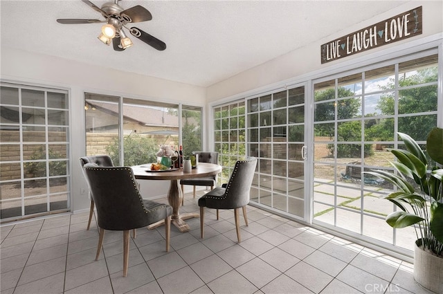 4950 Via Campeche, Riverside, CA 92507 - sunroom / solarium with tile patterned floors, a ceiling fan, a textured ceiling, and outdoor dining space