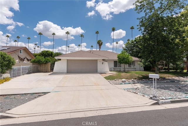 4950 Via Campeche, Riverside, CA 92507 - ranch-style house featuring stucco siding, driveway, and a garage
